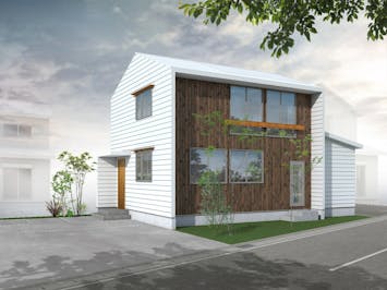 外壁に白いガルバリウム鋼鈑と杉板外壁を使用したコンパクトでかわいらしい外観が特徴です